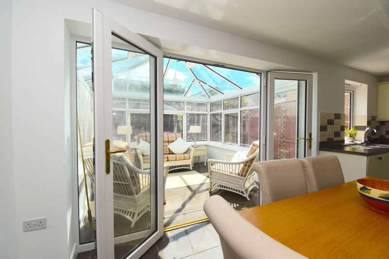 Kitchen through to Garden Room- click for photo gallery